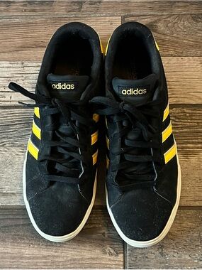 adidas Black Sneakers with Yellow Three-Stripe Detail